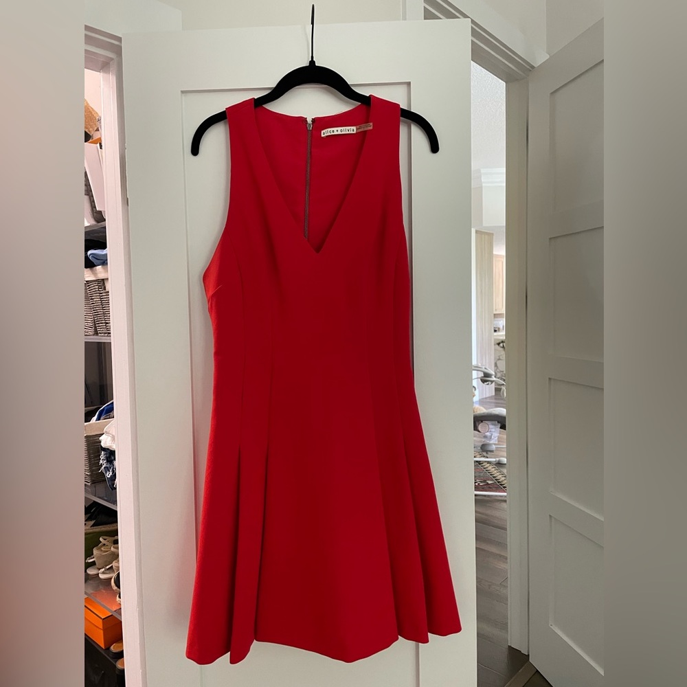 Worn a few times- Alice and Olivia red dress. Size 6, really good condition.